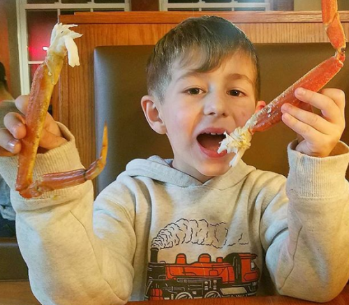 Child Eating Crab Legs